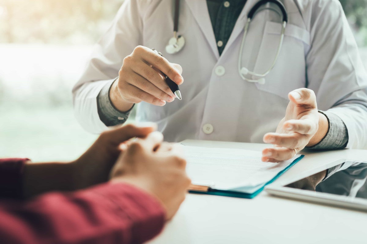 Doctor talking to patient