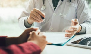 Doctor talking to patient